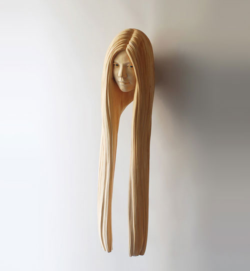 wood sculptures by artist yasuhiro sakurai