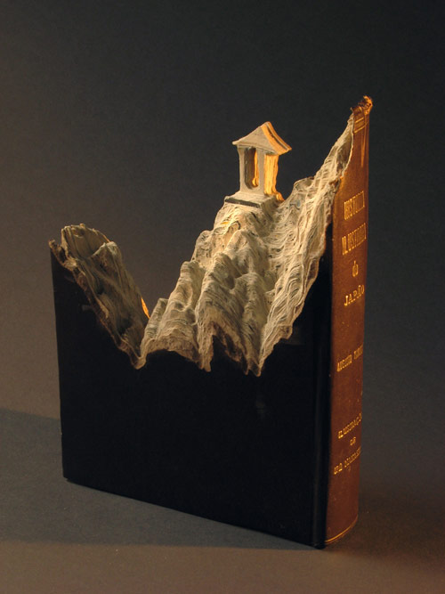 Book sculptures by artist Guy Laramee
