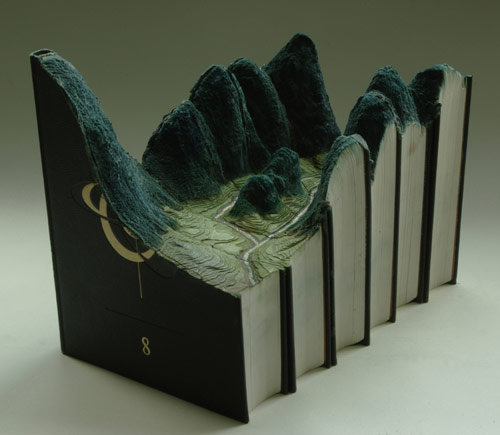 Book sculptures by artist Guy Laramee
