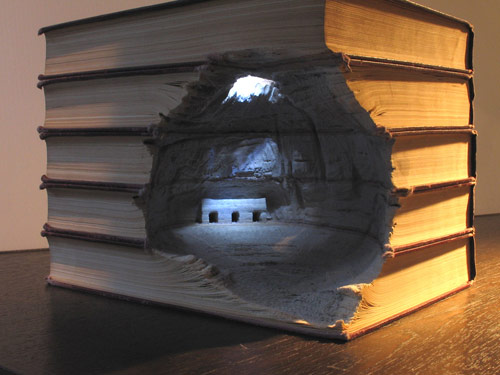 Book sculptures by artist Guy Laramee