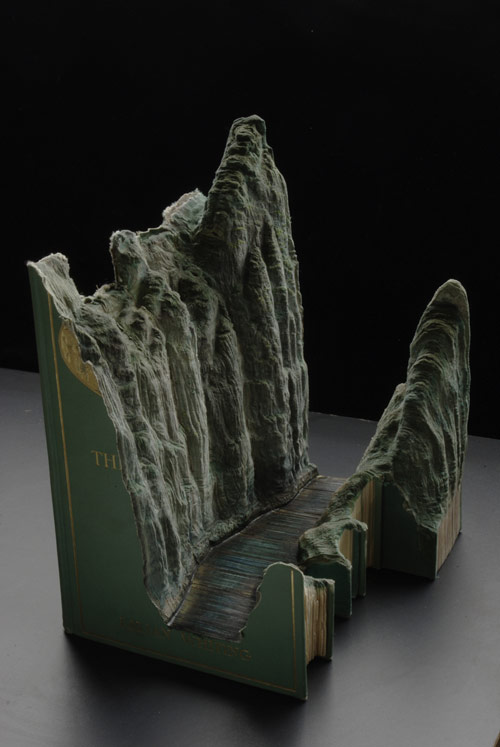 Book sculptures by artist Guy Laramee
