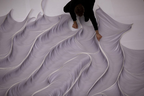 Installation made of 10,000 strips of paper by Daniele Papuli