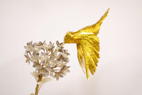 gold hummingbirds by Diana Beltran Herrera