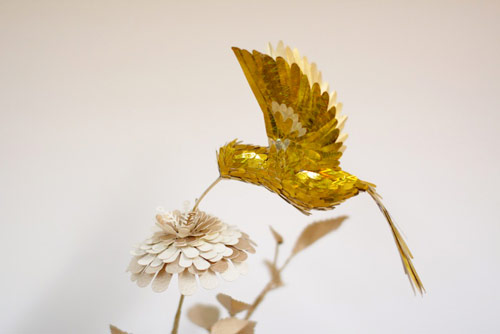 gold hummingbirds by Diana Beltran Herrera