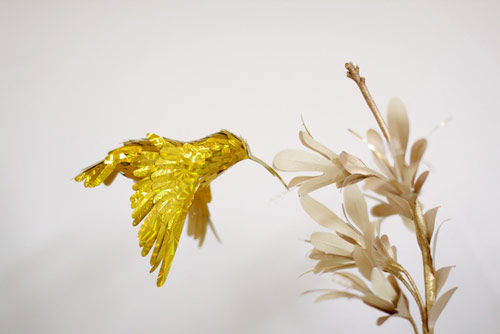 gold hummingbirds by Diana Beltran Herrera