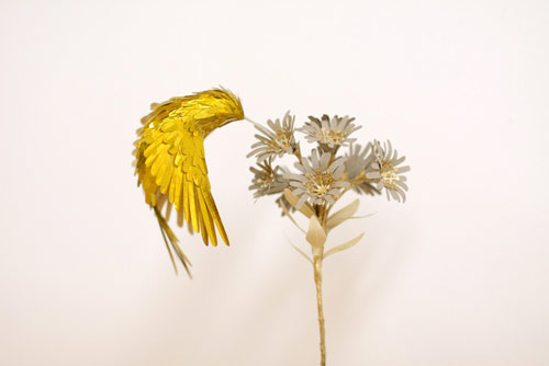 gold hummingbirds by Diana Beltran Herrera