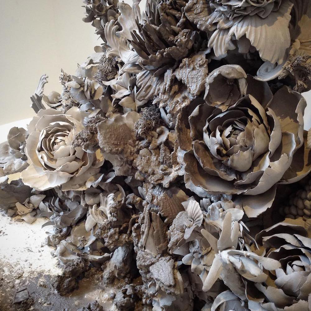 Temporary Floral Sculptures Made From Raw, Unfired Clay by Artist
